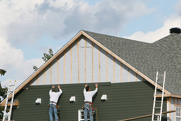 Professional Siding Replacement technician working in Peninsula, OH